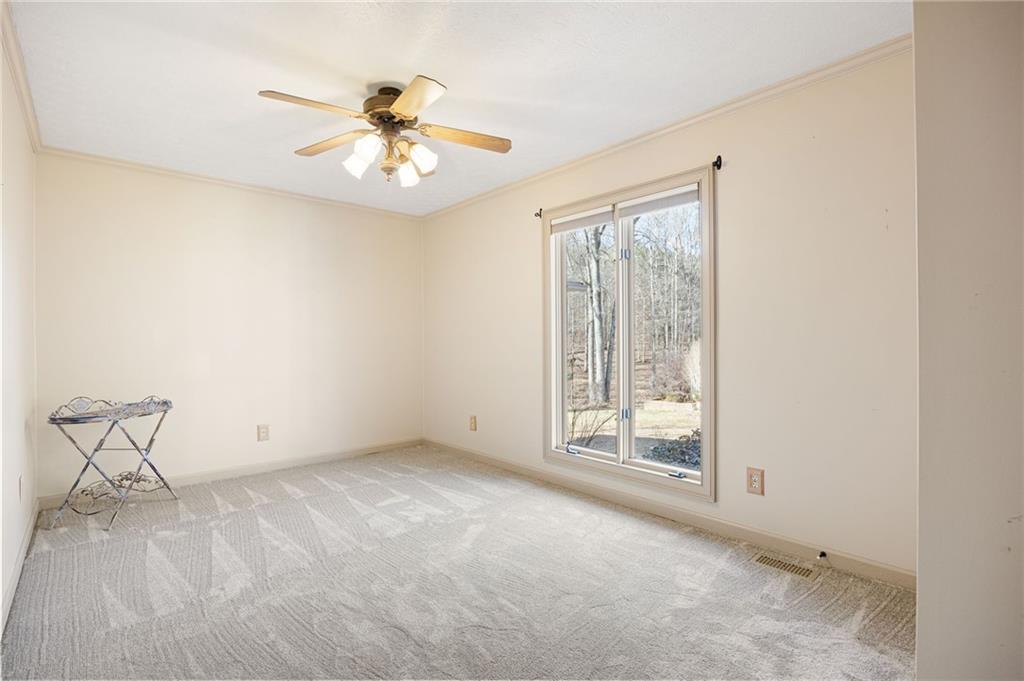 8277 Buchanan Highway Dallas, GA 30157 - Photo 16 of 36 a view of an empty room with a window