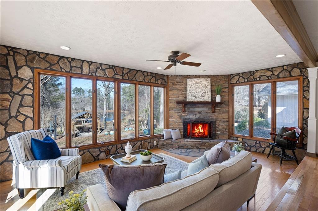 8277 Buchanan Highway Dallas, GA 30157 - Photo 21 of 36 a living room with furniture and a fireplace