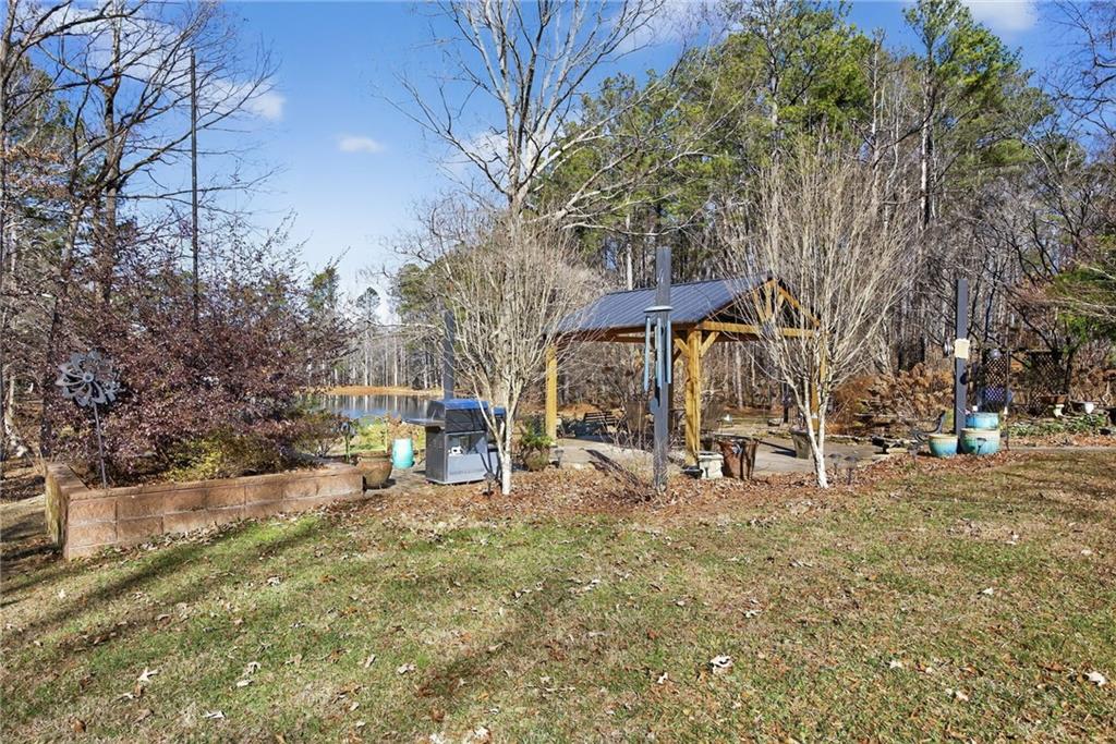 8277 Buchanan Highway Dallas, GA 30157 - Photo 32 of 36 a view of a outdoor space with a tree