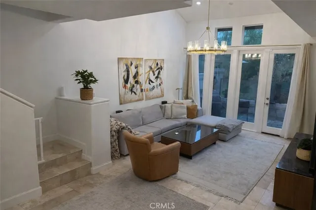 a living room with furniture and a rug