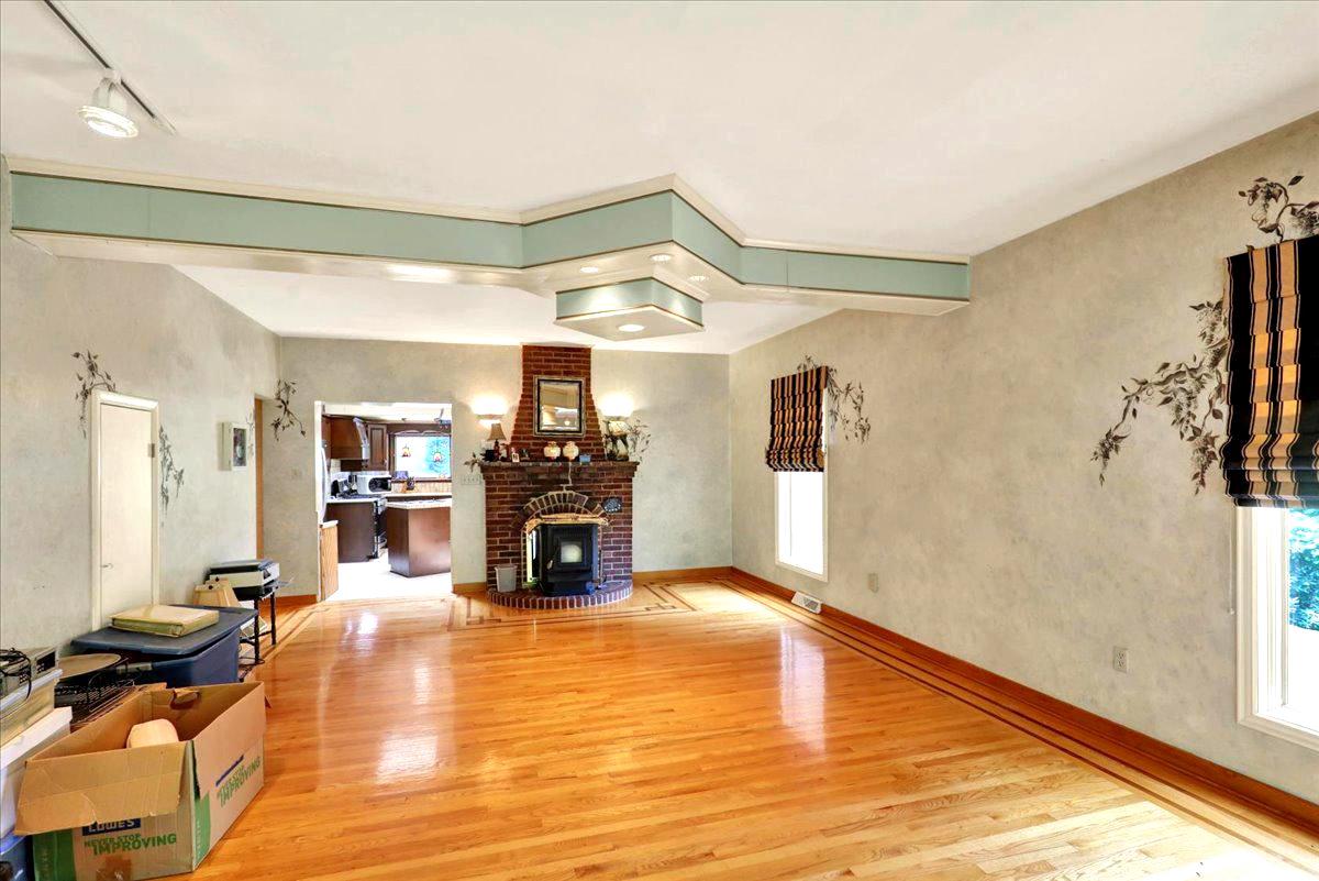 126 West Neversink Road Reading, PA 19606 - Photo 13 of 40 Charming fireplace and beautiful hardwood floors.