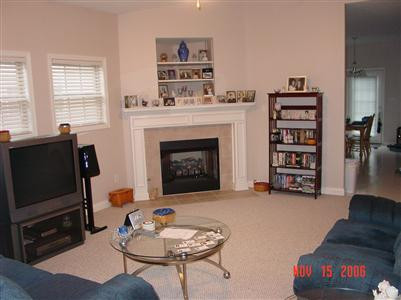 Gas log fireplace in great room.