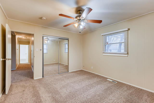 1923 Cherokee Road Carpentersville, IL 60110 - Photo 10 of 17 an empty room with fan and windows