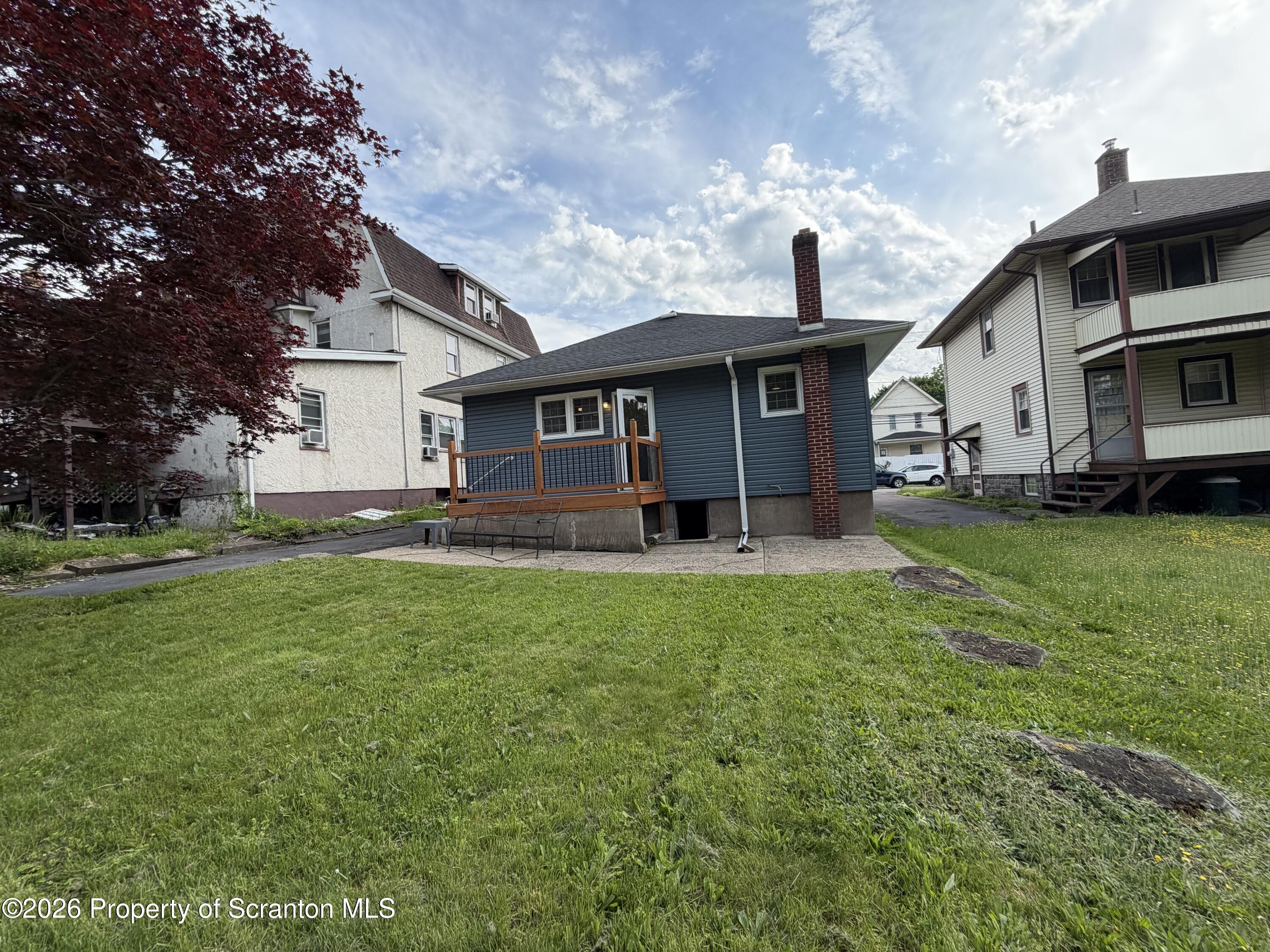 1019 Moosic Street Scranton, PA 18505 - Photo 42 of 43 a front view of house with yard and green space