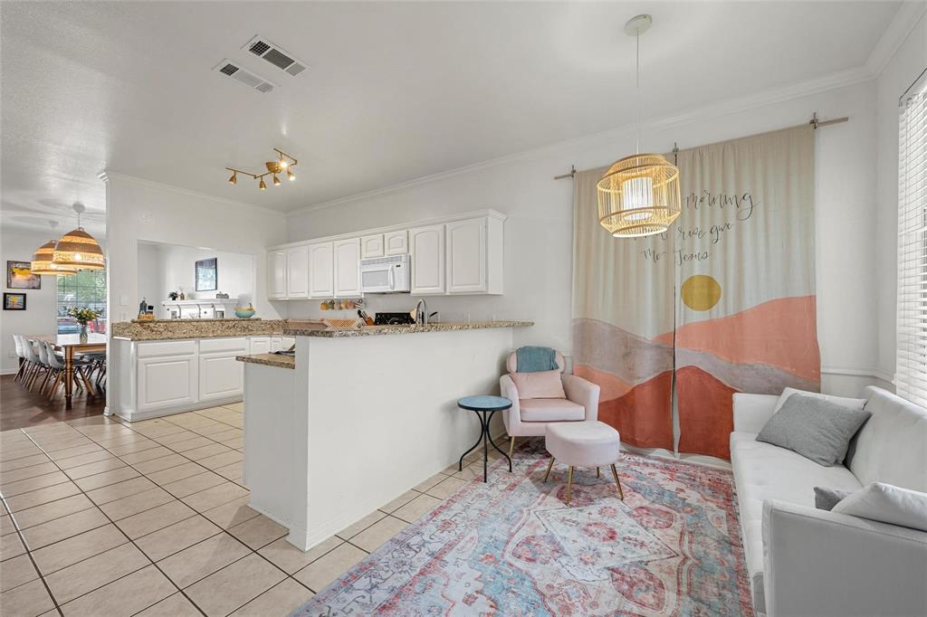 1915 South 7th Street Waco, TX 76706 - Photo 39 of 40 a living room with furniture and a window