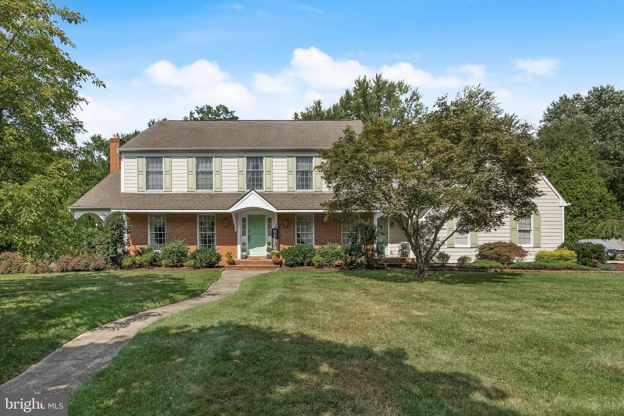 803 Fernwood Road Moorestown, NJ 08057 - Photo 1 of 46 a front view of a house with a garden