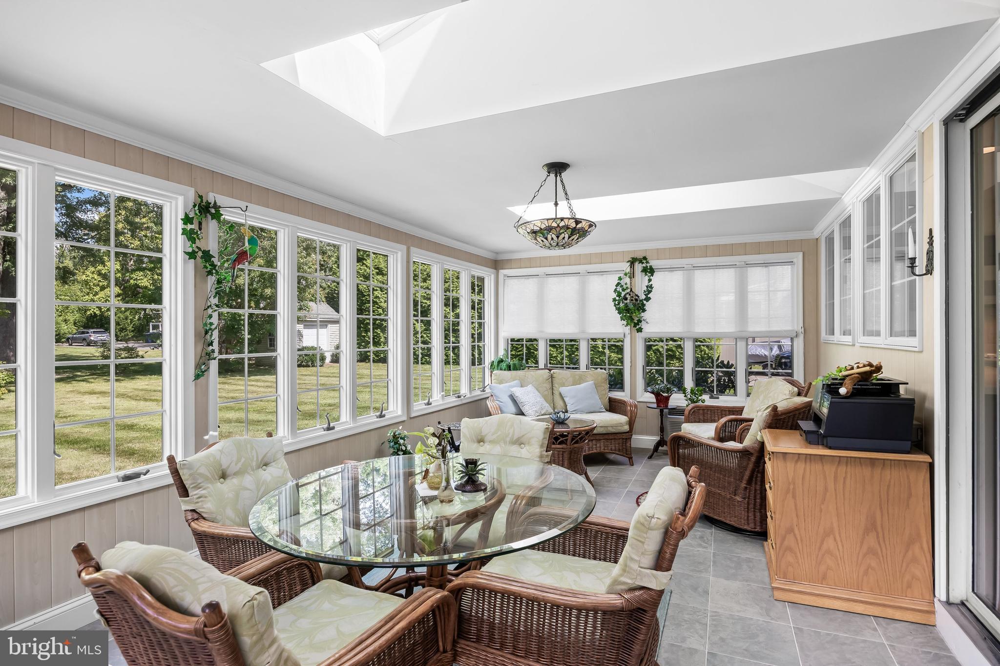 803 Fernwood Road Moorestown, NJ 08057 - Photo 21 of 46 a living room with furniture and large windows