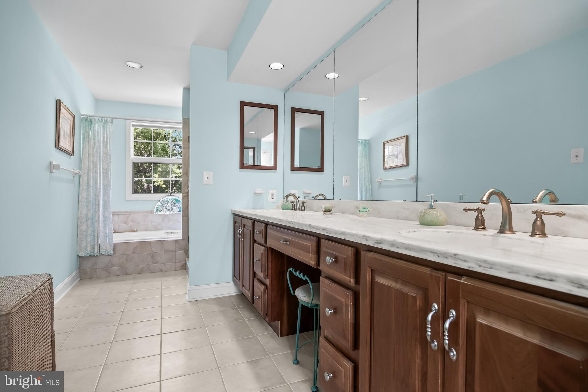 803 Fernwood Road Moorestown, NJ 08057 - Photo 29 of 46 a bathroom with a granite countertop sink a mirror and a bathtub