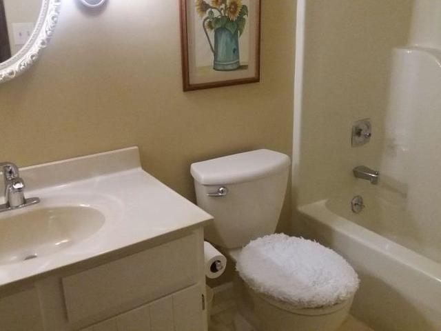 2574 South Nantucket Court Decatur, IL 62521 - Photo 22 of 25 a bathroom with a sink and toilet