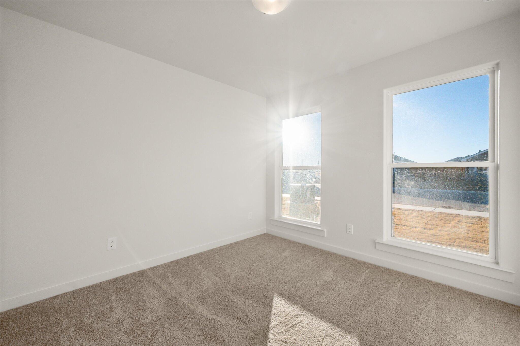 6311 Volney Avenue Lubbock, TX 79407 - Photo 17 of 23 an empty room with a window