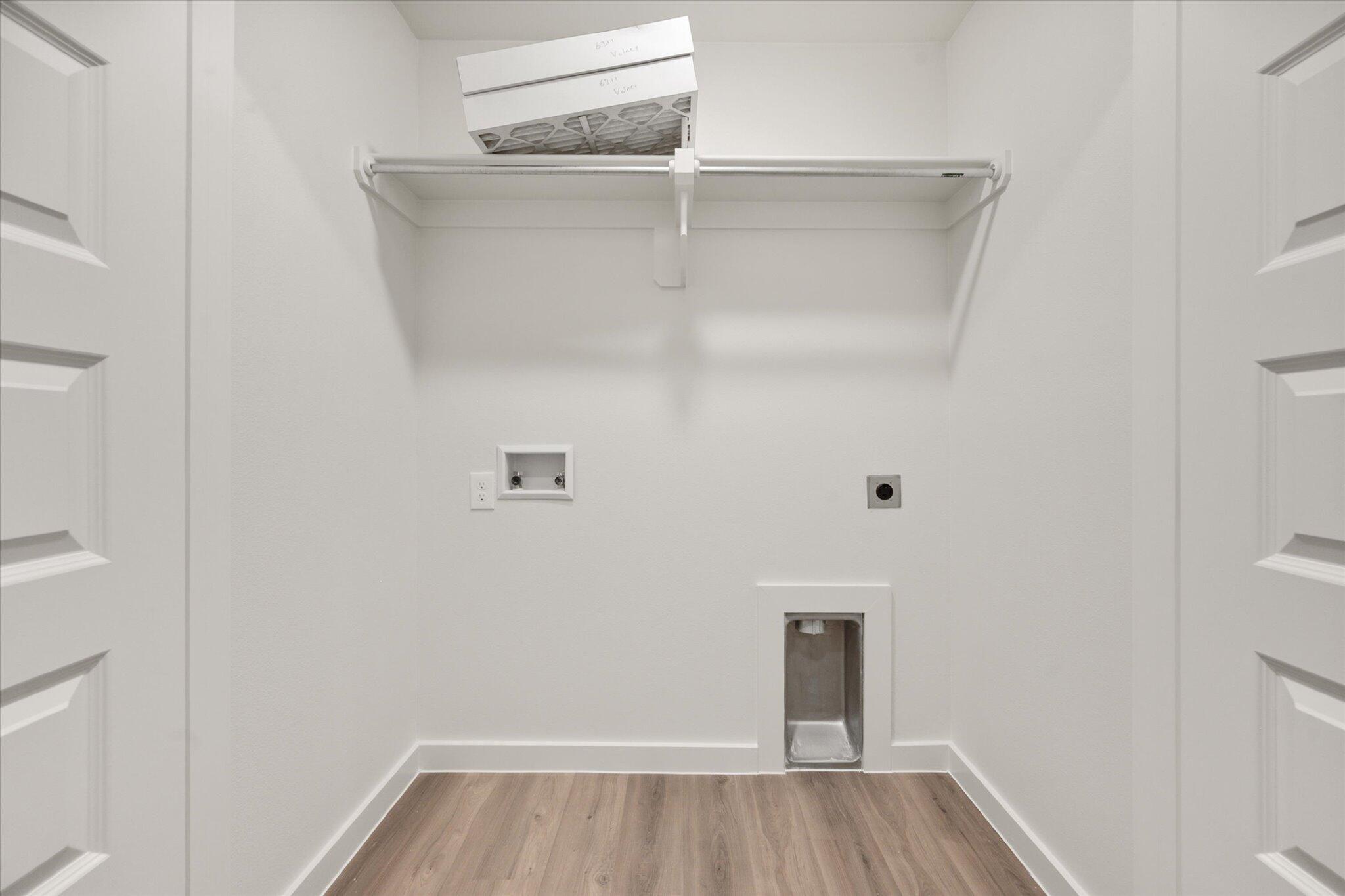 6311 Volney Avenue Lubbock, TX 79407 - Photo 21 of 23 a view of a room with wooden floor