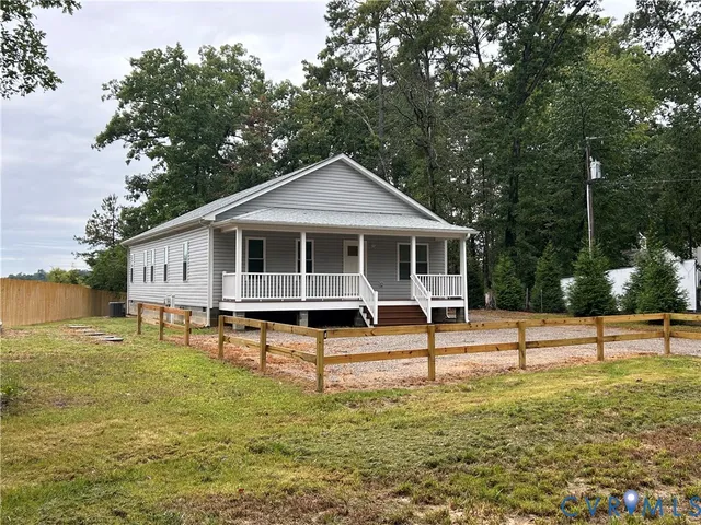 a house view with a garden space