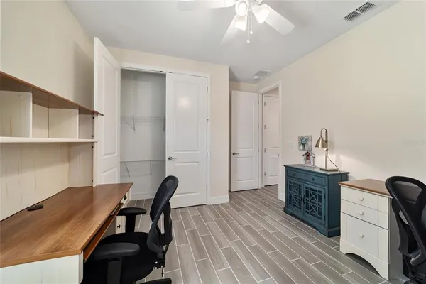 a kitchen with a sink a stove and cabinets