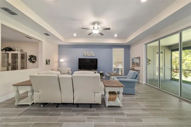 a living room with a couch and a flat screen tv