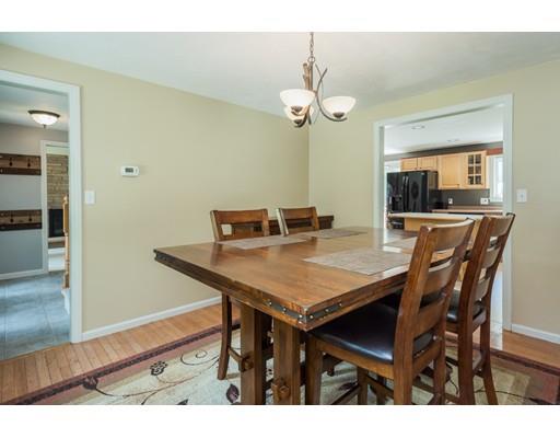 95 Pleasant Street Paxton, MA 01612 - Photo 10 of 31 a view of a dining room with furniture and a chandelier