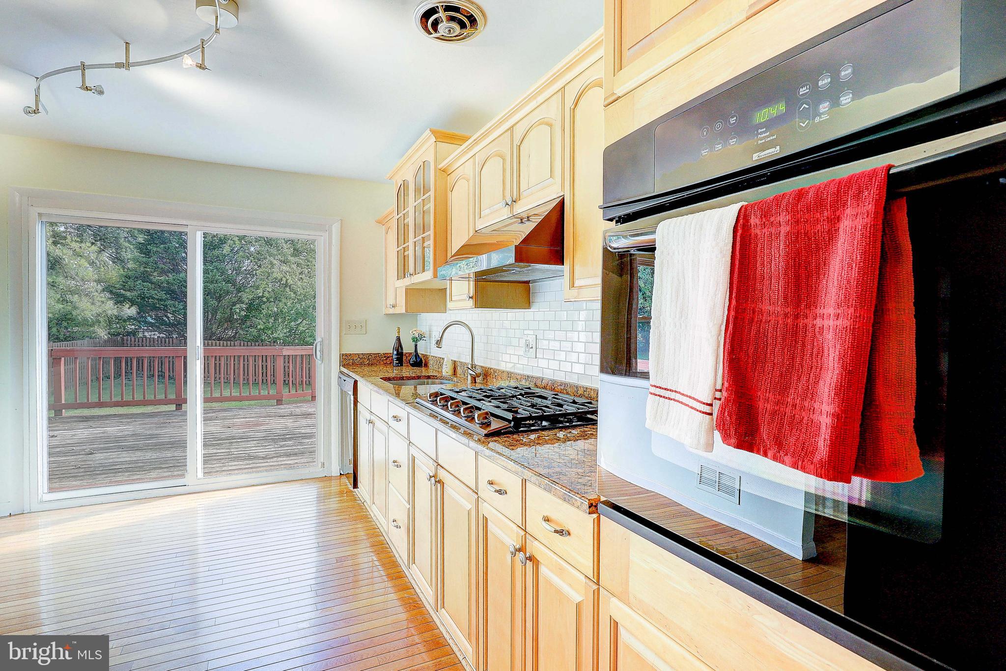 3905 Roxanne Road Randallstown, MD 21133 - Photo 12 of 38 Sliding glass door opens to large deck