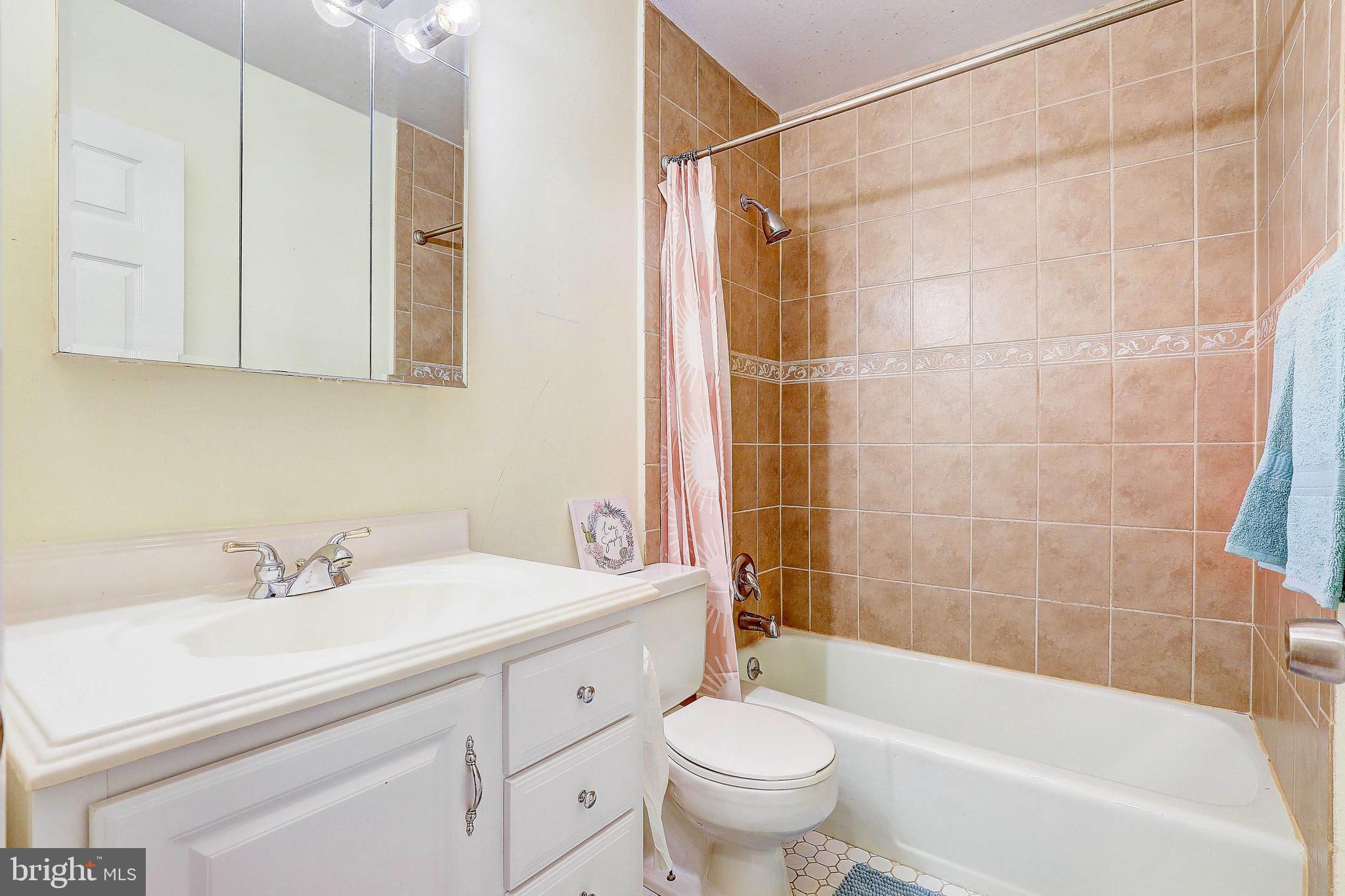 3905 Roxanne Road Randallstown, MD 21133 - Photo 14 of 38 Remodeled, full bathroom located in the hallway