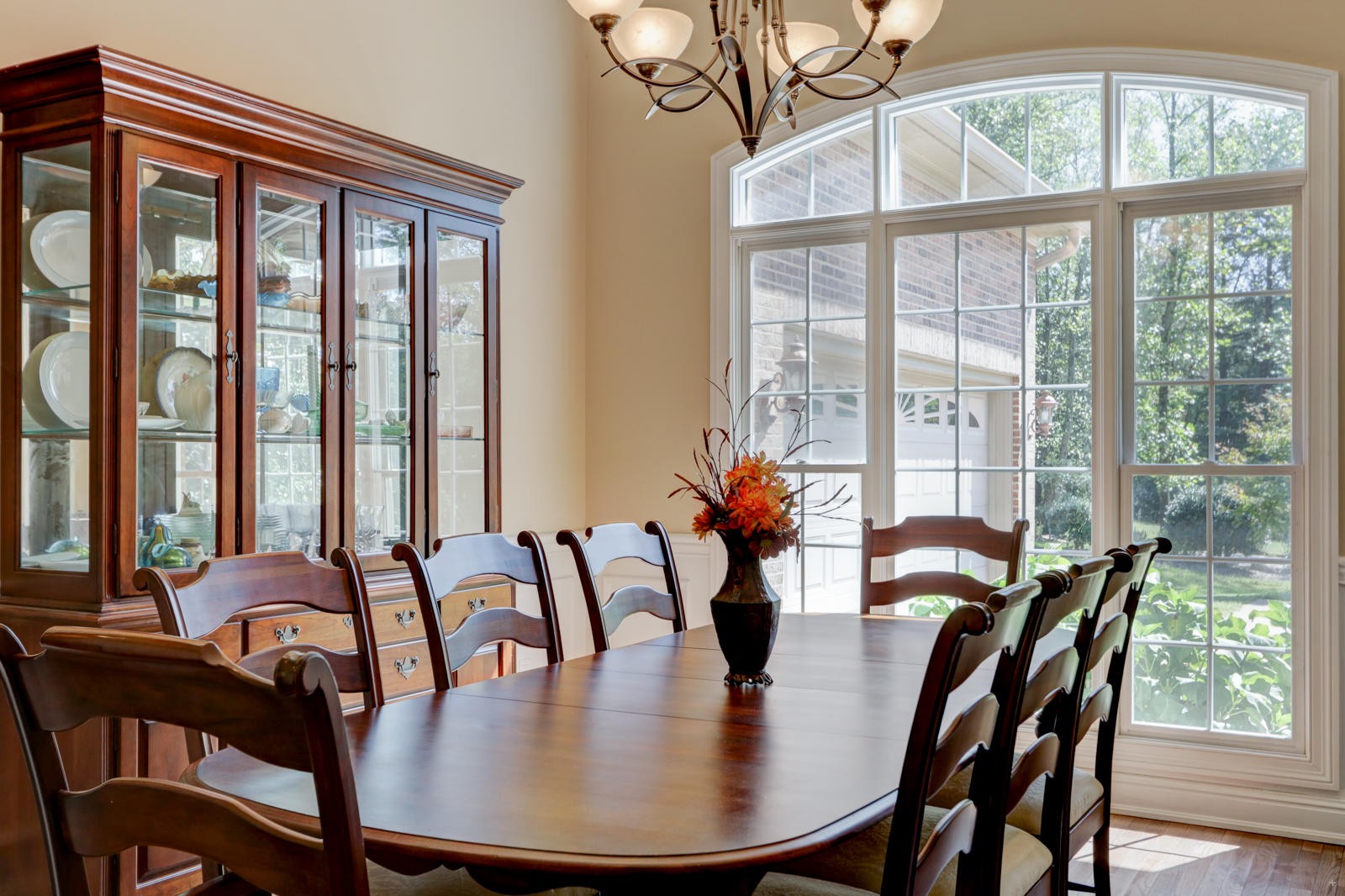 2300 Matlock Bend Road Loudon, TN 37774 - Photo 9 of 39 a view of a dining room with furniture large windows and wooden floor