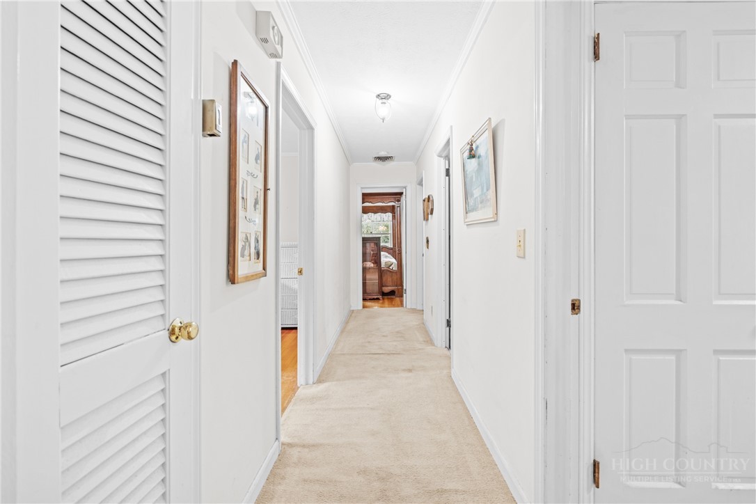 1794 Highway 105 Boone, NC 28607 - Photo 25 of 29 a view of a hallway with white walls