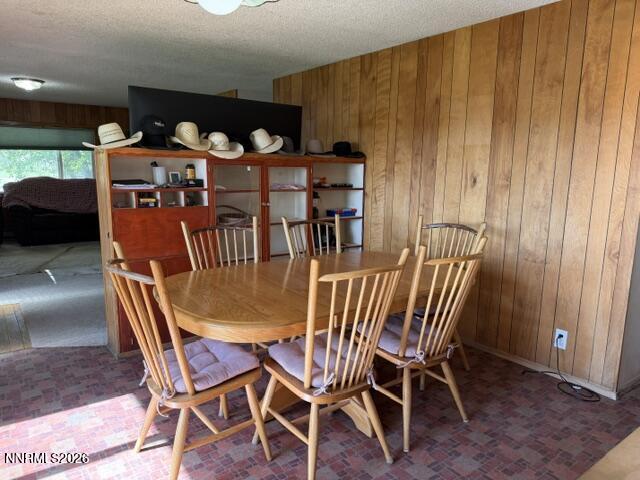 61 Rivers Road Smith, NV 89430 - Photo 31 of 57 a view of a dining room with furniture and chandelier