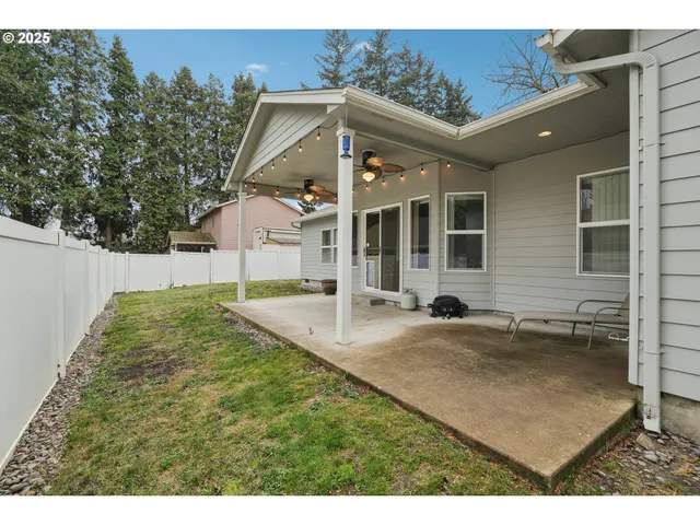 a backyard of a house with lots of green space
