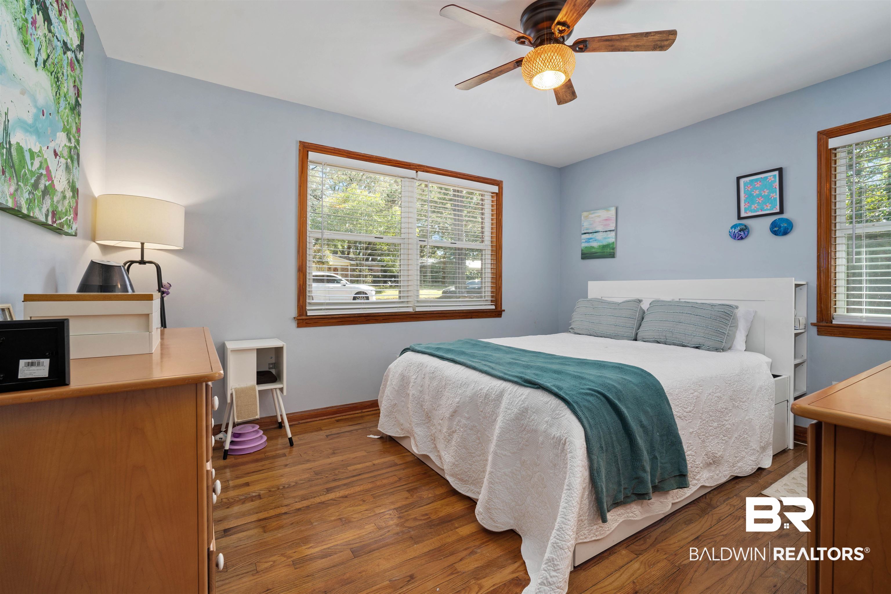 672 Tarawa Drive Mobile, AL 36609 - Photo 16 of 26 Bedroom with hardwood / wood-style flooring, ceiling fan, multiple windows, and a desk