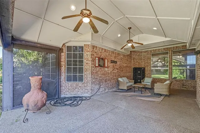 a view of a livingroom with furniture and a fireplace