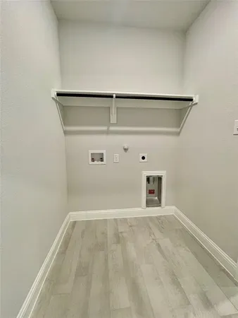 a view of a livingroom with wooden floor