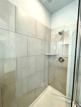 a white toilet sitting in a bathroom