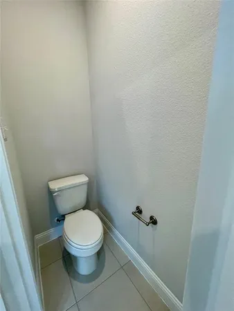 a spacious bathroom with a double vanity sink and a mirror