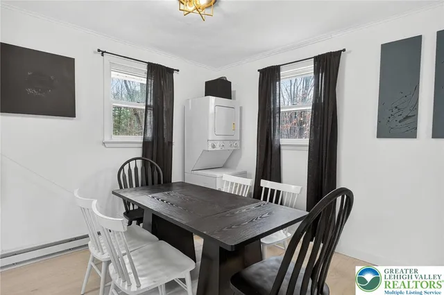 a view of a dining room with furniture