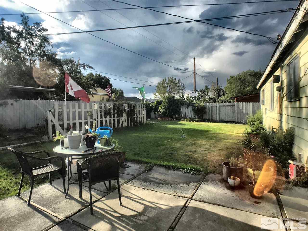 1225 Manhattan Street Reno, NV 89512 - Photo 16 of 19 a view of a fountain in the backyard
