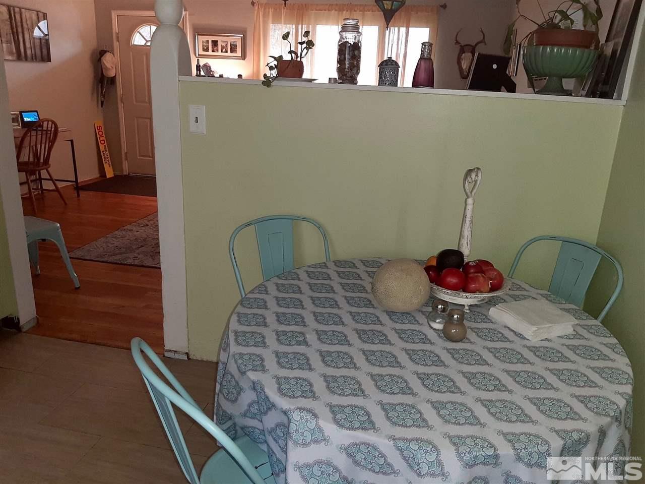 1225 Manhattan Street Reno, NV 89512 - Photo 8 of 19 a vase of flowers sitting on a table