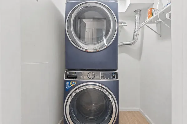 a utility room with dryer and washer