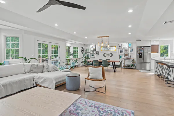 a living room with furniture and a table