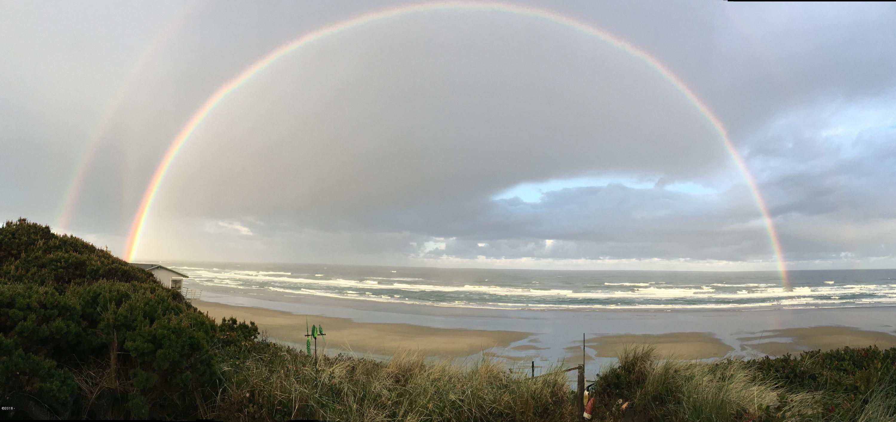 1032 Southwest Mark Street Newport, OR 97365 - Photo 34 of 37 Rainbow over Ocean