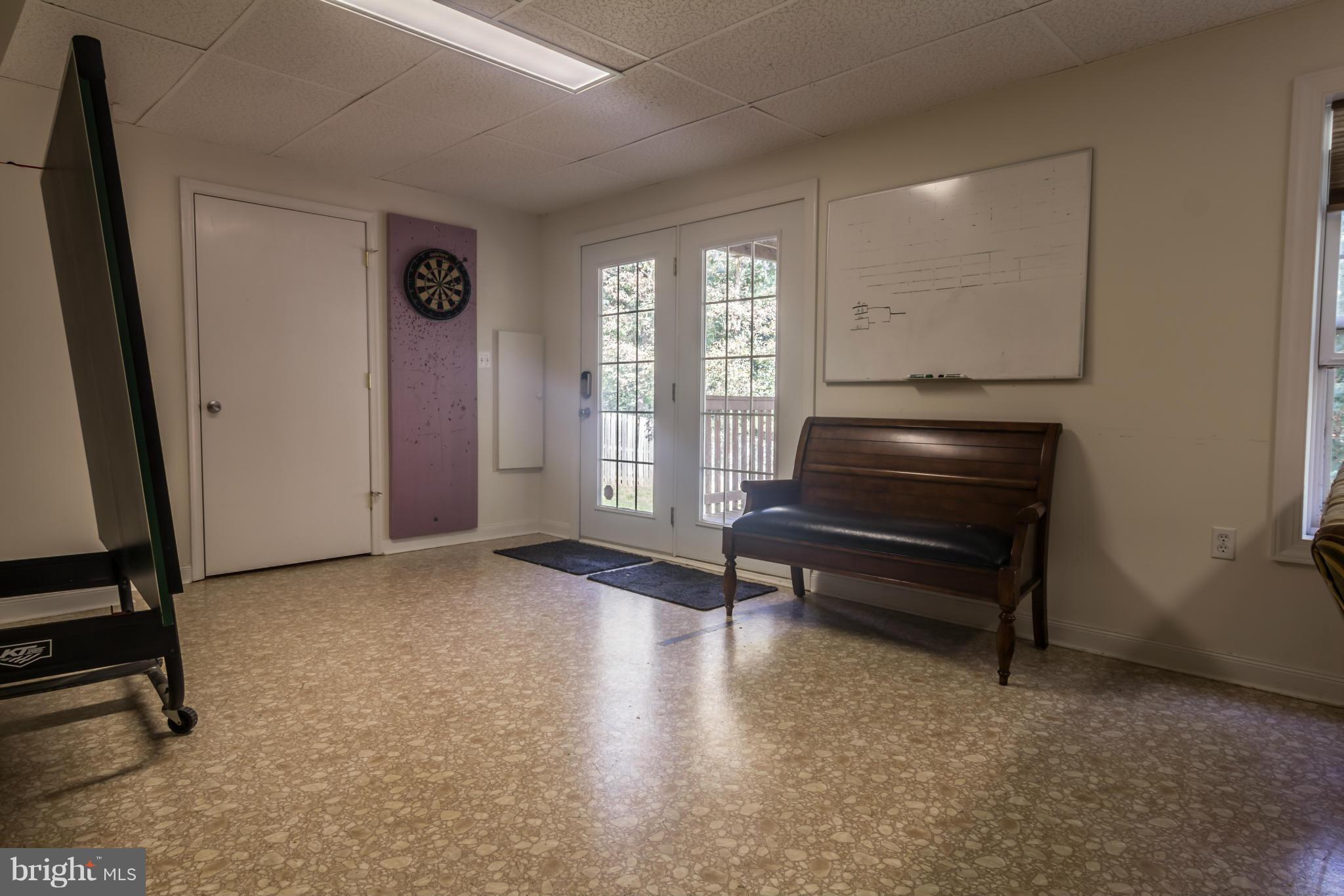 122 Asbury Road Winchester, VA 22602 - Photo 26 of 30 Finished rec room w/walkout to lower deck