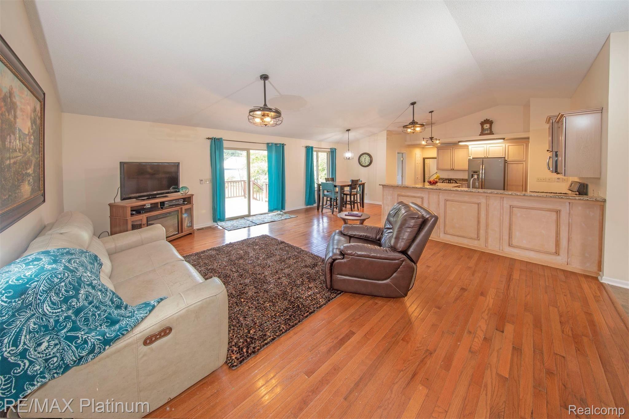 542 South Hughes Road Howell, MI 48843 - Photo 26 of 26 Open Floor Plan Great Room Breakfast Area and Kitchen