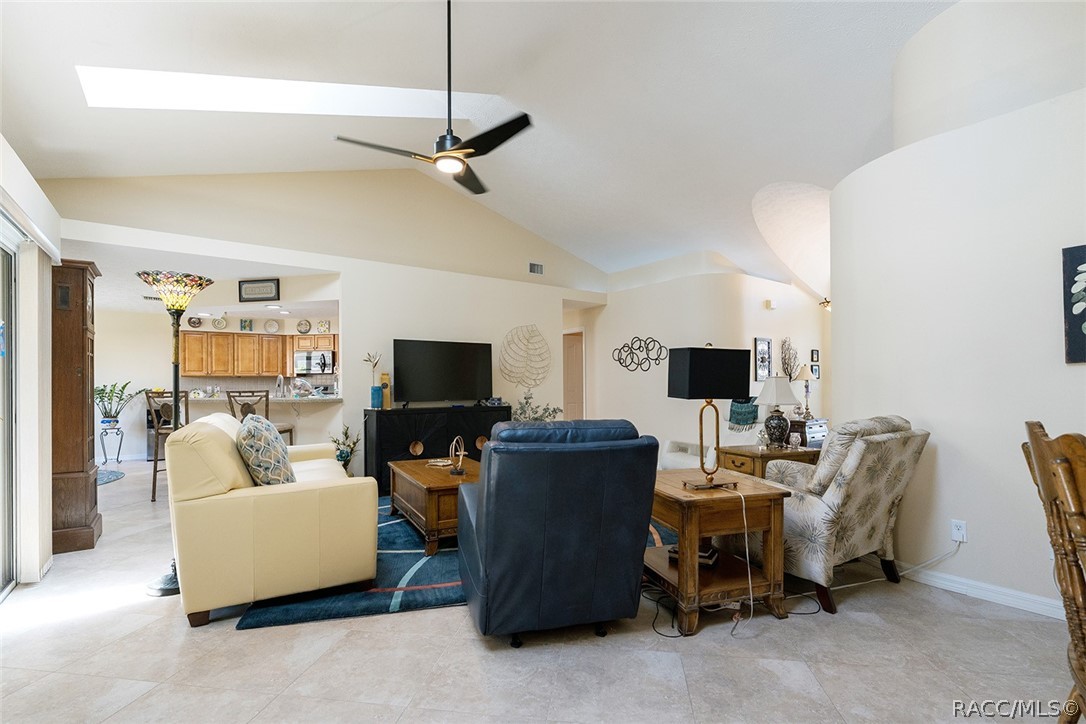 800 Balmoral Court Inverness, FL 34453 - Photo 6 of 72 a living room with furniture and a flat screen tv