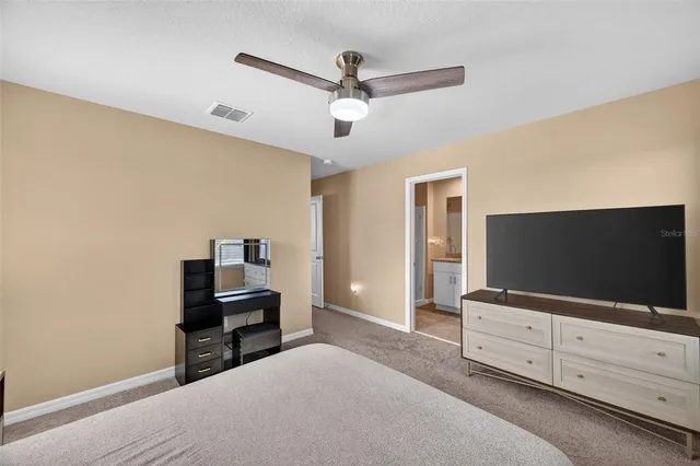 a living room with flat screen tv