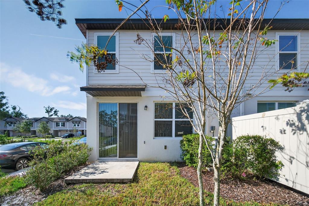2761 Emory Sound Place Brandon, FL 33510 - Photo 22 of 27 a front view of a house with a tree in the background