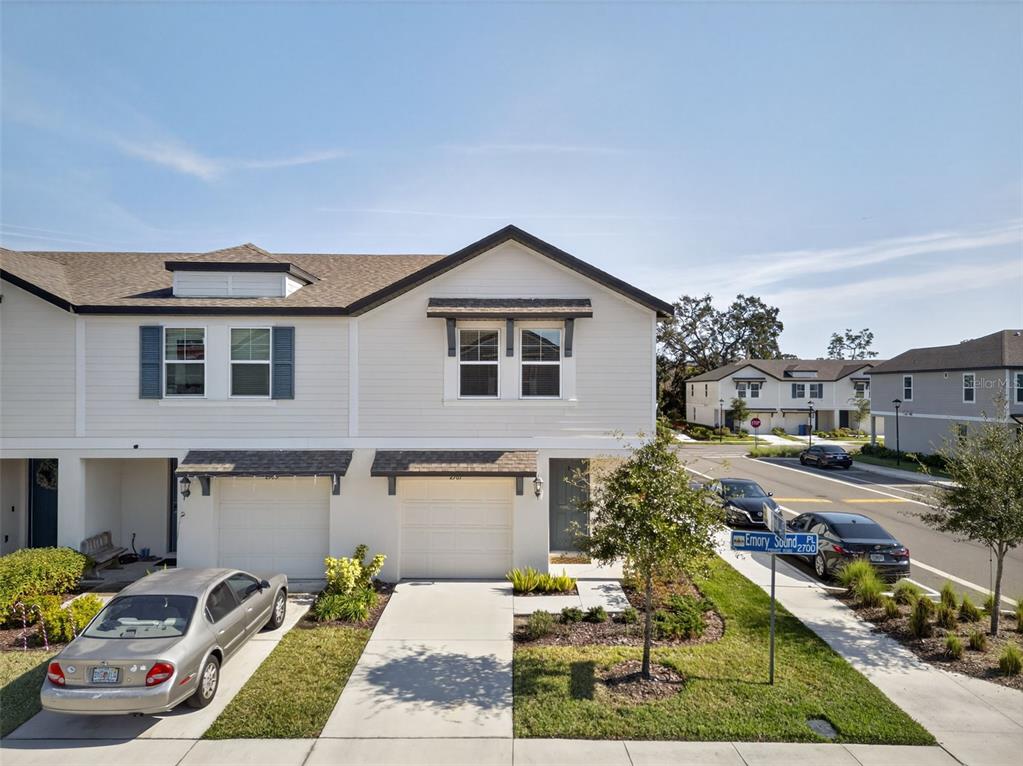 2761 Emory Sound Place Brandon, FL 33510 - Photo 26 of 27 a front view of a house with garden