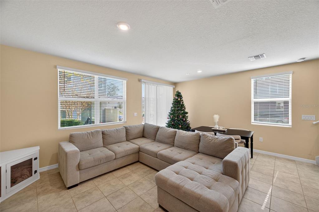 2761 Emory Sound Place Brandon, FL 33510 - Photo 6 of 27 a living room with furniture and a window