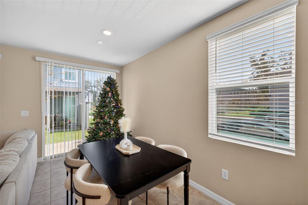 2761 Emory Sound Place Brandon, FL 33510 - Photo 8 of 27 a view of a room that has a window and a table in it