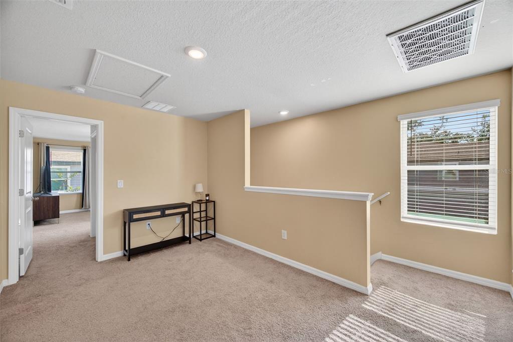 2761 Emory Sound Place Brandon, FL 33510 - Photo 10 of 27 an empty room with windows