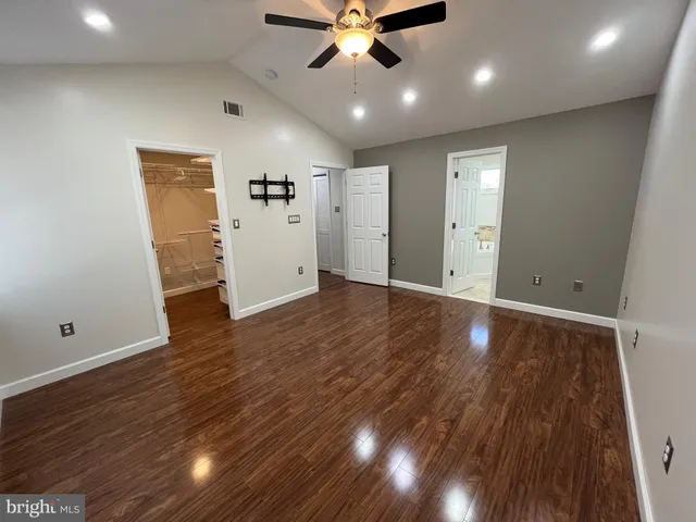 a view of a livingroom with wooden floor