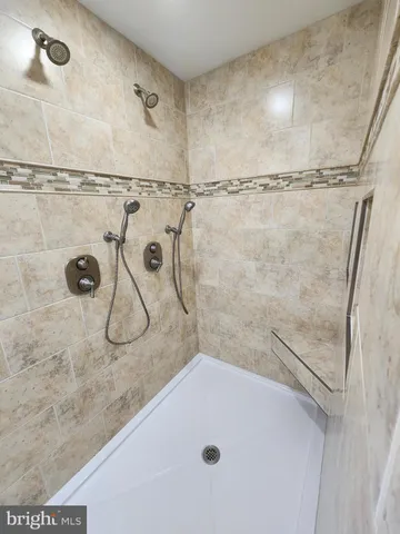 a view of room with wooden floor