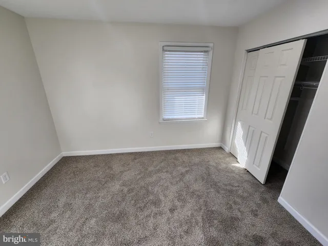 a bathroom with a sink toilet and vanity