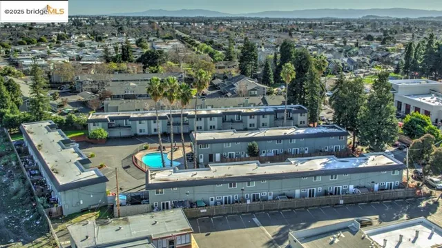 a view of a chairs and table in the roof