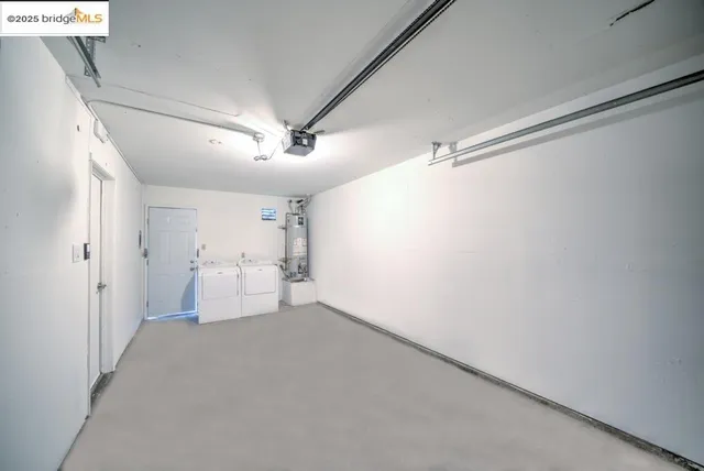 a view of a room with cabinet and a ceiling fan